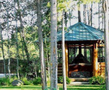 Silverwolf Log Chalets Coram Exterior photo