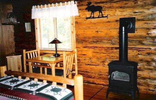 Silverwolf Log Chalets Coram Exterior photo